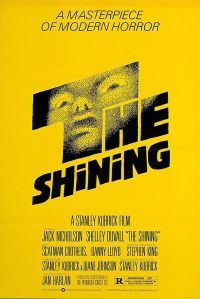 Original movie poster for The Shining, a yellow background with a horrified face in the letters of the title