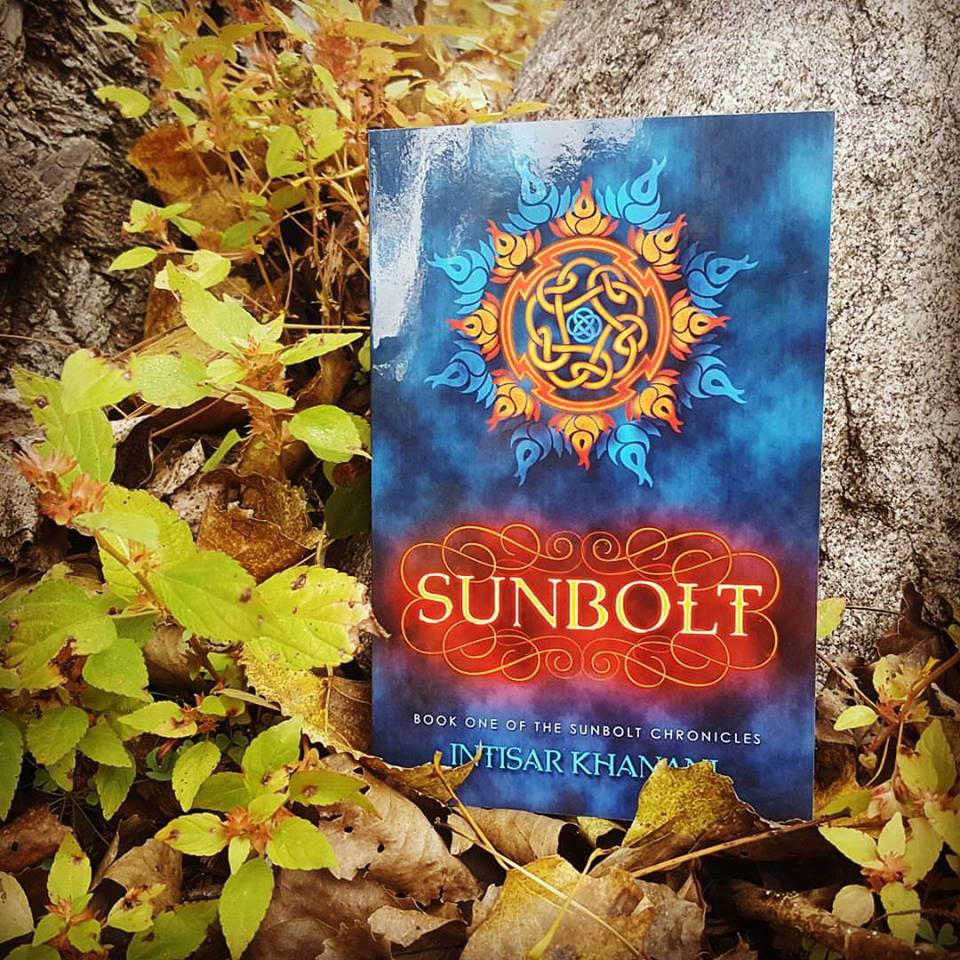 Sunbolt by Intisar Khanani, F-BOM Fall 2017 book of the month, in colorful fall leaves