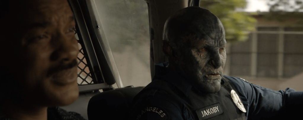 Ward and Jakoby in a police car